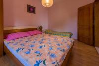 Posteľ alebo postele v izbe v ubytovaní Apartments Djusi