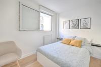 Tempat tidur dalam kamar di Le Vitry - Appt 2 Chambres &agrave; 20min Orly