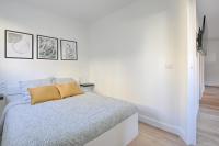 Tempat tidur dalam kamar di Le Vitry - Appt 2 Chambres &agrave; 20min Orly