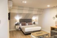 Postel nebo postele na pokoji v ubytování Hotel Palacete de Alamos