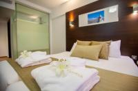 Postel nebo postele na pokoji v ubytování Amorgos Boutique Hotel