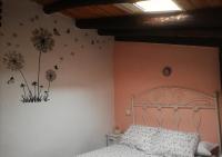 Postel nebo postele na pokoji v ubytování Casa Rural La Callejuela