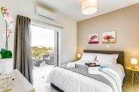 Posteľ alebo postele v izbe v ubytovaní Cyan Icons Villas Kalyves Chania