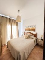 Posteľ alebo postele v izbe v ubytovaní Apartamentos Villa Torcal