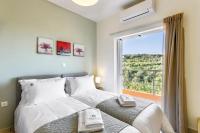 Posteľ alebo postele v izbe v ubytovaní Cyan Icons Villas Kalyves Chania