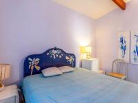 Posteľ alebo postele v izbe v ubytovaní Apartment L'Olivastre by Interhome