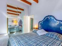 Posteľ alebo postele v izbe v ubytovaní Apartment L'Olivastre by Interhome