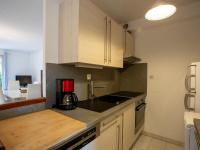 Kuchyňa alebo kuchynka v ubytovaní Holiday Home Tahiti Parc-4 by Interhome