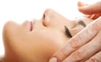 a woman is getting her face closed with her eyelashes at Domaine Lagardelle Rocamadour in Rocamadour