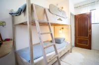 Posteľ alebo postele v izbe v ubytovaní Casa Ancladero Big rooftop terrace, 2 bedroom guesthouse w garden and view