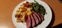 a plate of food with meat potatoes and green beans at Domaine Lagardelle Rocamadour in Rocamadour
