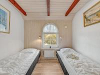 Postel nebo postele na pokoji v ubytování Holiday Home Sannie - 450m from the sea by Interhome