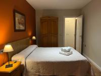 A bed or beds in a room at Complejo la Regalina