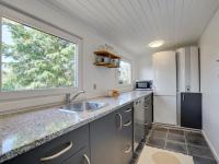 Kuchyň nebo kuchyňský kout v ubytování Holiday Home Kanerva - 350m from the sea by Interhome