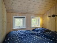 Postel nebo postele na pokoji v ubytování Holiday Home Hunlef - 400m from the sea by Interhome