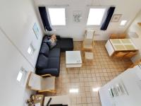 Posezení v ubytování Apartment Tomte - 70m from the sea by Interhome