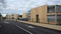 an empty street in a city with buildings at valras appartement T2 proche mer et port in Valras-Plage