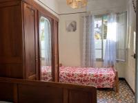 Łóżko lub łóżka w pokoju w obiekcie Charmant T3 avec jardin à deux pas de la plage - 5 couchages, animaux acceptés - FR-1-225C-117