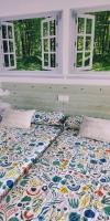 Vv casafaromar oceanfront comfortにあるベッド