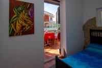 Posteľ alebo postele v izbe v ubytovaní Casa vacanze Gigli