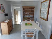 Telewizja i/lub zestaw kina domowego w obiekcie Maison avec vue exceptionnelle et piscine privative