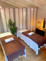 Hotel L'Océanにあるベッド