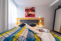 Łóżko lub łóżka w pokoju w obiekcie Apartament DREAM