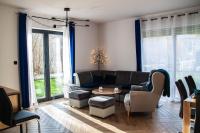Część wypoczynkowa w obiekcie Apartament rodzinny Słoneczna Sosnówka