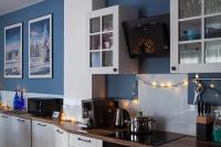 Kuchnia lub aneks kuchenny w obiekcie Apartament rodzinny Słoneczna Sosnówka