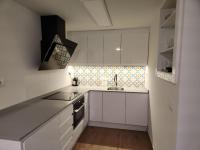 Kuchyňa alebo kuchynka v ubytovaní Moderno Apartamento Colon con Vistas al Mar Calpe