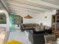Posezení v ubytování Jávea Villa entière piscine et cuisine d'été à pinosol