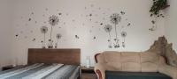 Posteľ alebo postele v izbe v ubytovaní Lugas Apartman