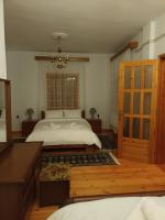 Posteľ alebo postele v izbe v ubytovaní Georgia House Portaria