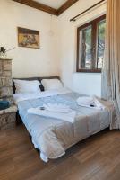 Posteľ alebo postele v izbe v ubytovaní Villa Dianne Apt 1 Livadi Arachovas