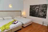 Posteľ alebo postele v izbe v ubytovaní Hotel Anacapri