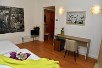 Posteľ alebo postele v izbe v ubytovaní Hotel Anacapri