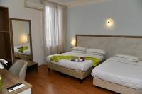 Posteľ alebo postele v izbe v ubytovaní Hotel Anacapri