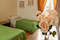 Posteľ alebo postele v izbe v ubytovaní Hotel Anacapri
