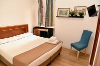 Posteľ alebo postele v izbe v ubytovaní Hotel Anacapri