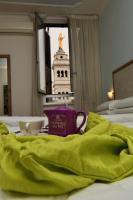 Posteľ alebo postele v izbe v ubytovaní Hotel Anacapri
