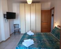 Posteľ alebo postele v izbe v ubytovaní Gentarrubia - a casa nel cuore della città