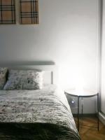 Posteľ alebo postele v izbe v ubytovaní Apartament przy Karmelu