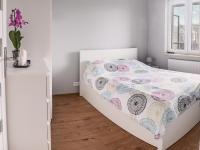 Marywilska apartmentにあるベッド