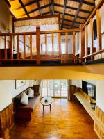 a living room with a bunk bed and a couch at 見晴花園山莊Sunshine Villa in Ren&#39;ai