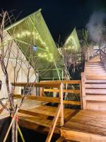 a wooden deck with lights on top of it at 見晴花園山莊Sunshine Villa in Ren&#39;ai