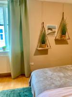 Postel nebo postele na pokoji v ubytování Luxurious city apartment incl garage and terrace