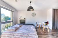 Łóżko lub łóżka w pokoju w obiekcie Bourgonnier 19 - Charmant studio à Angers