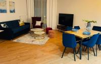 Telewizja i/lub zestaw kina domowego w obiekcie Apartament Pełen Słońca - Pinea Pobierowo