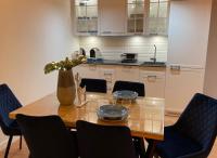 Kuchnia lub aneks kuchenny w obiekcie Apartament Pełen Słońca - Pinea Pobierowo