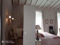 Posteľ alebo postele v izbe v ubytovaní Finca La Favorita- Suites